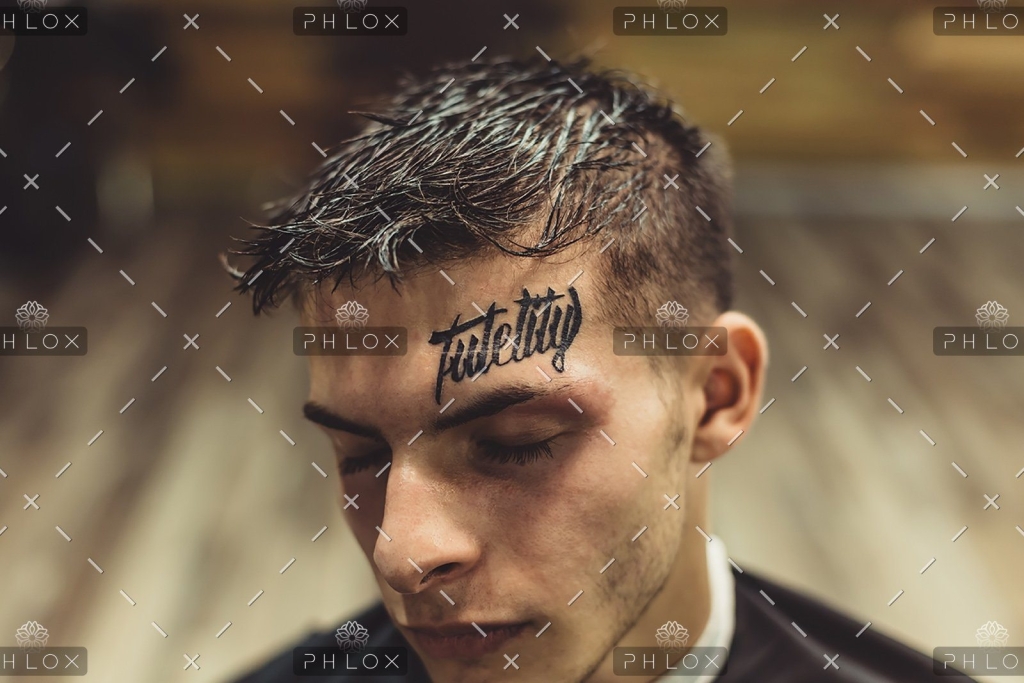demo-attachment-328-portrait-of-man-with-tattoo-PJPNNRD-2